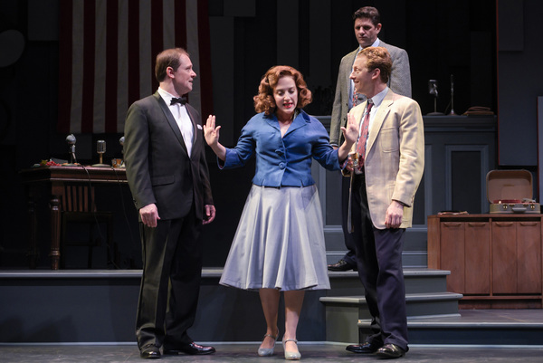 Natalie (Donna Vivino, center) steps in during a heated conversation between Mickey ( Photo